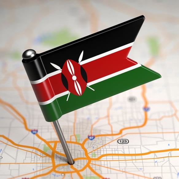 Small Flag of Kenya on a Map Background with Selective Focus..jpeg